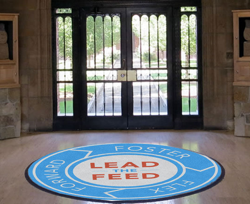 Indeed-Lead the Feed 6 X 6 Rubber Backed Carpeted HD Round - The Personalized Doormats Company