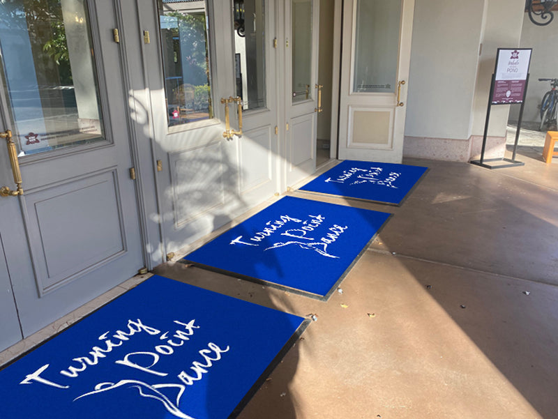 Turning Point lobby door rug