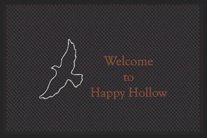 Happy Hollow welcome mat with logo