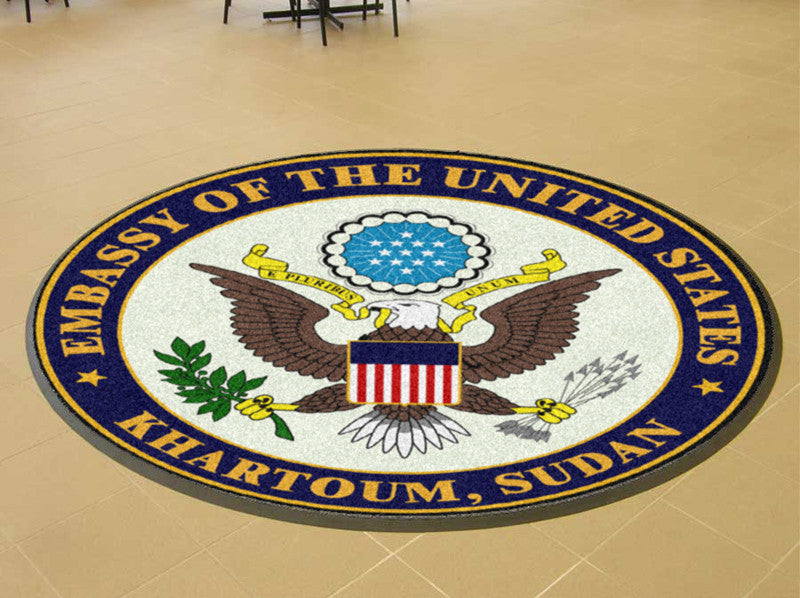 EMBASSY OF THE UNITED STATES OF AMERICA 6 X 6 Rubber Backed Carpeted HD Round - The Personalized Doormats Company