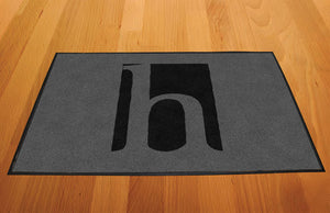 Huff Rubber Mat Black Logo on Sandlewood 2 X 3 Rubber Backed Carpeted - The Personalized Doormats Company