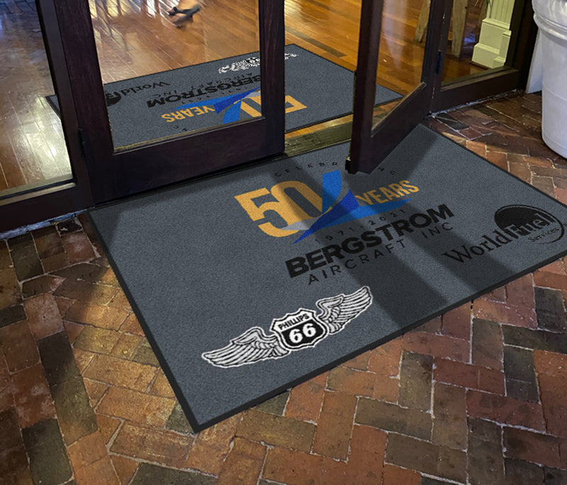 Bergstrom 50th anniversary welcome mat